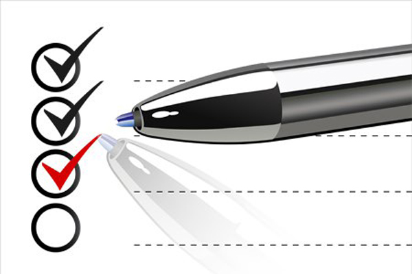 Pen ticking boxes on a list